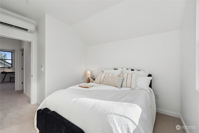 carpeted bedroom with lofted ceiling and a wall mounted air conditioner