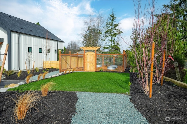 3917 Crosswinds Ct, Anacortes, WA 98221 - view of yard featuring a garden and fence