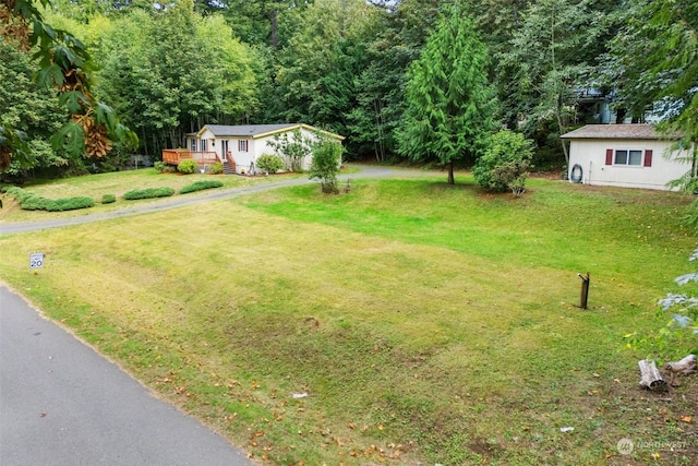 11 SE Fuchsia Ave, Shelton, WA 98584 - view of grassy yard with a deck