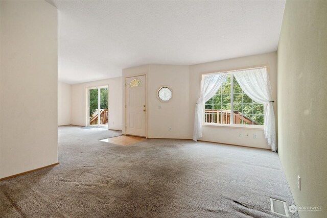 11 SE Fuchsia Ave, Shelton, WA 98584 - carpeted foyer entrance featuring baseboards