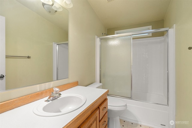 full bathroom with tile patterned floors, shower / bath combination with glass door, toilet, and vanity