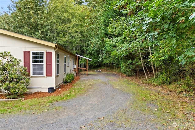 11 SE Fuchsia Ave, Shelton, WA 98584 - view of side of home with crawl space and driveway