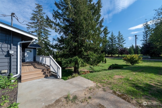 view of yard featuring a deck