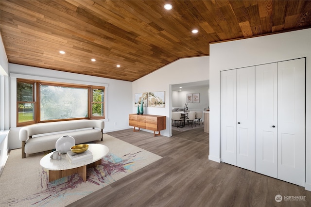 living room featuring vaulted ceiling, wood-type flooring, and wooden ceiling