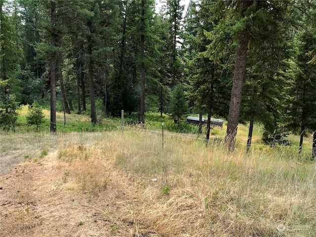 view of landscape featuring a view of trees