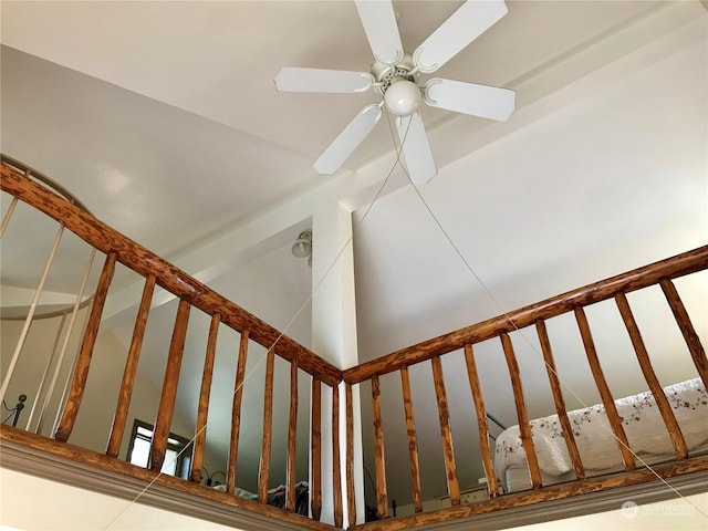 stairway with ceiling fan