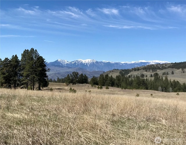 view of mountain feature with a rural view