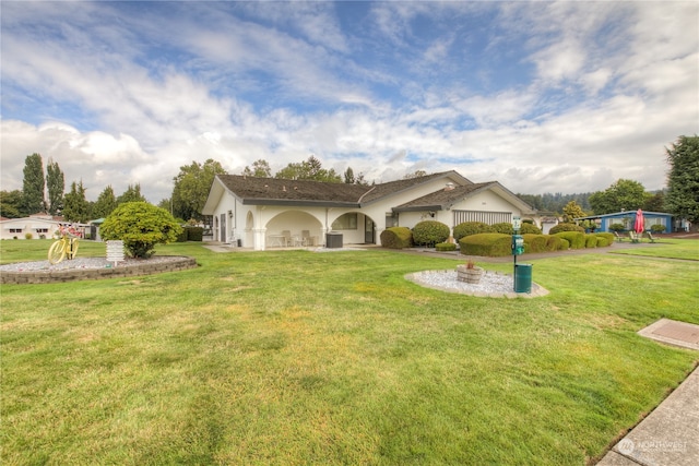 exterior space with a front yard