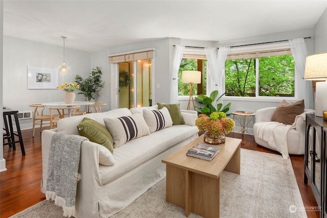 living room with light hardwood / wood-style flooring