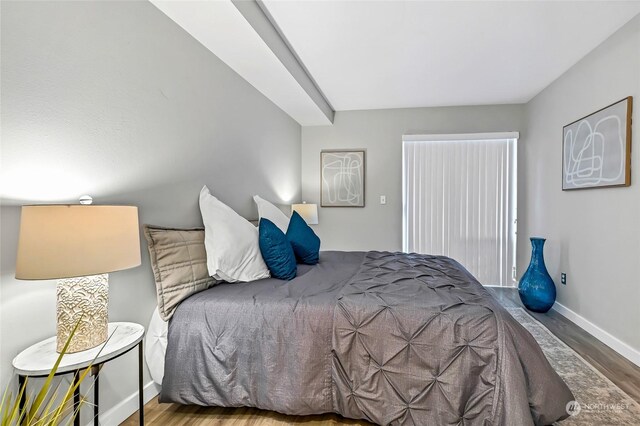 bedroom featuring wood-type flooring