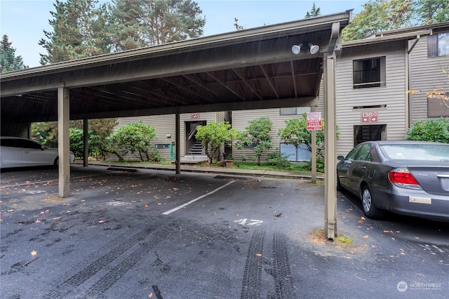 view of parking with a carport