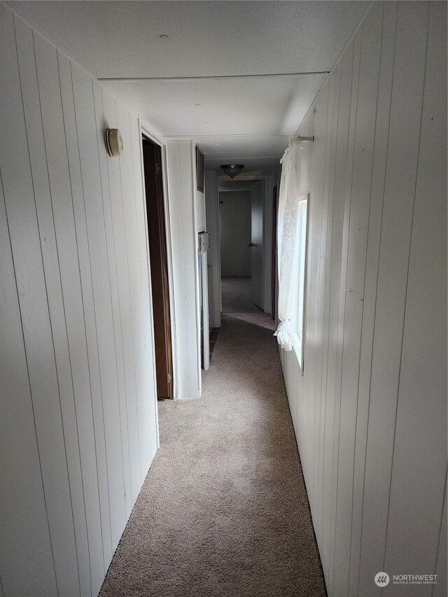 1111 Archwood Dr SW Unit 361, Olympia, WA 98502 - corridor with carpet and wood walls