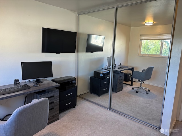 view of carpeted office space