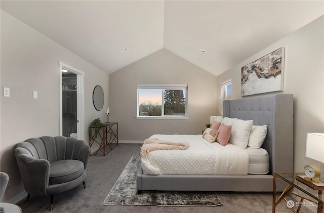 bedroom featuring vaulted ceiling, baseboards, carpet floors, and multiple windows