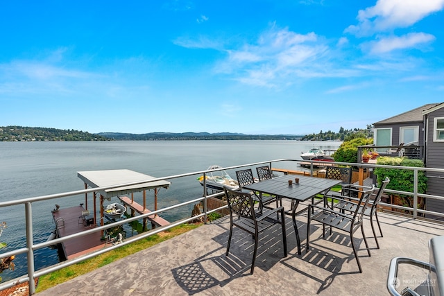 view of patio / terrace featuring a water view