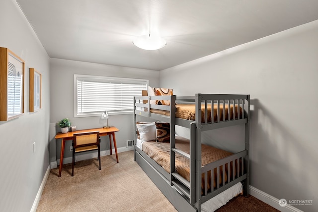 bedroom featuring carpet and multiple windows