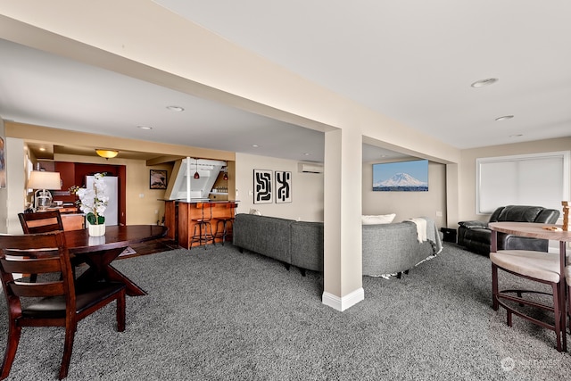 carpeted dining space with an AC wall unit