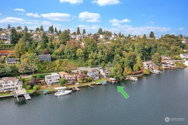 birds eye view of property featuring a water view