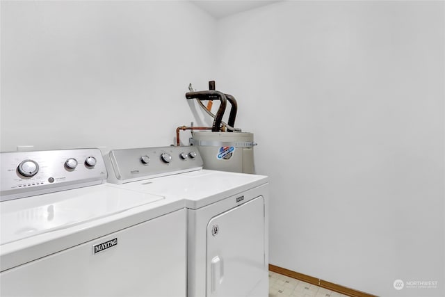 laundry room featuring washer and dryer and water heater