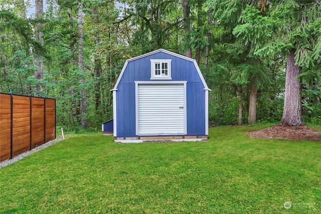 view of outdoor structure with a lawn