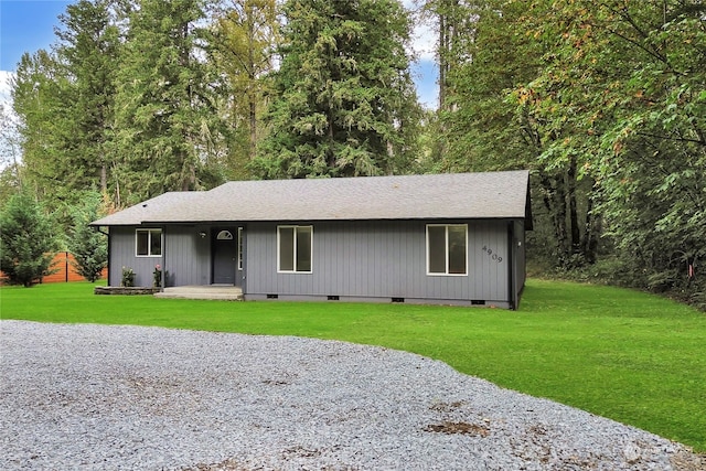 ranch-style home with a front yard