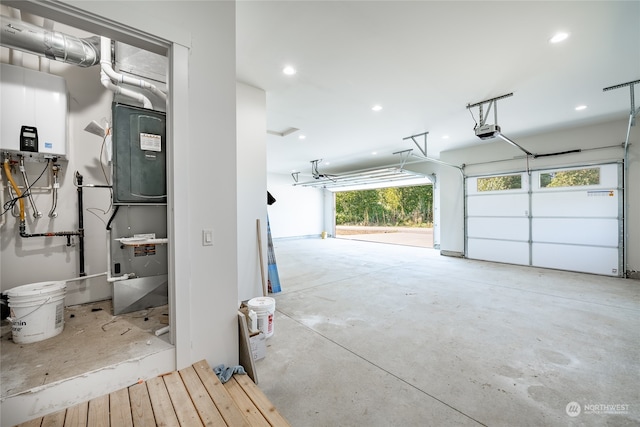 garage featuring water heater and a garage door opener