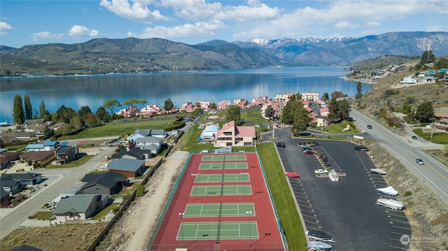 aerial view with a water and mountain view