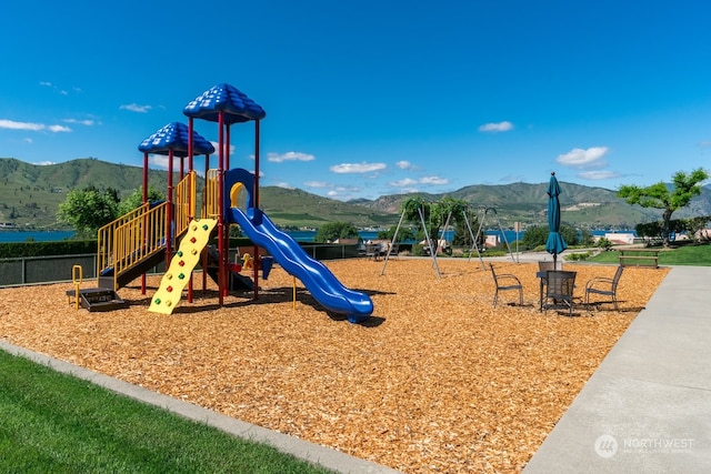 view of play area with a mountain view