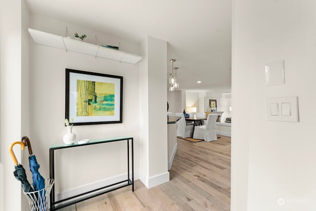 hallway featuring light hardwood / wood-style flooring