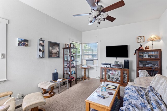 carpeted living room with cooling unit and ceiling fan