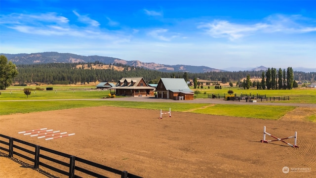 view of property's community featuring a mountain view and a rural view