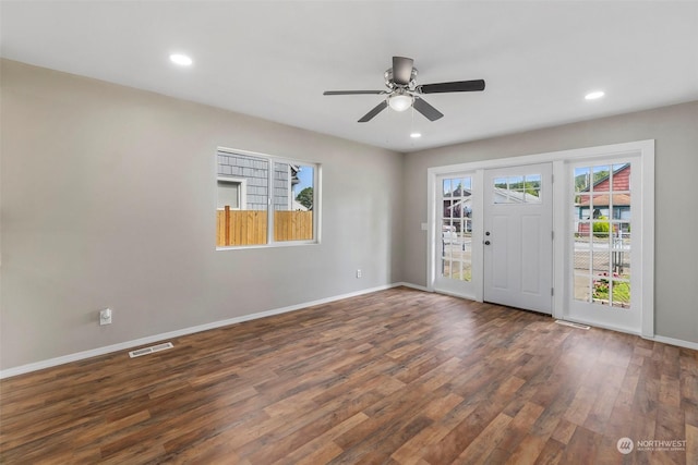 foyer entrance featuring recessed lighting, wood finished floors, visible vents, and baseboards