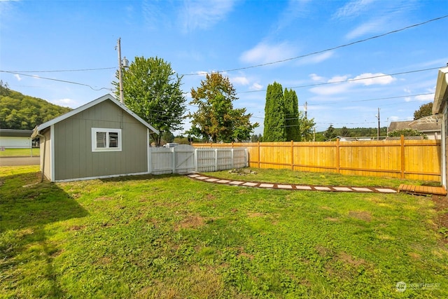 view of yard with a gate and fence