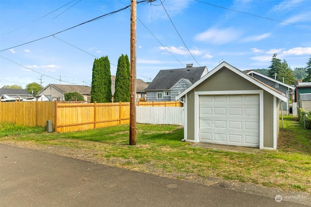 detached garage with fence