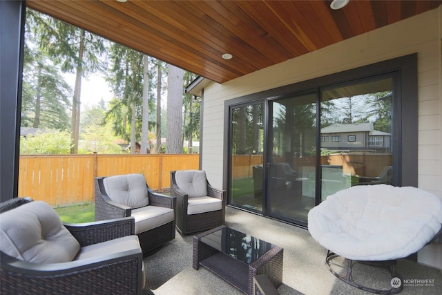 sunroom / solarium with wood ceiling