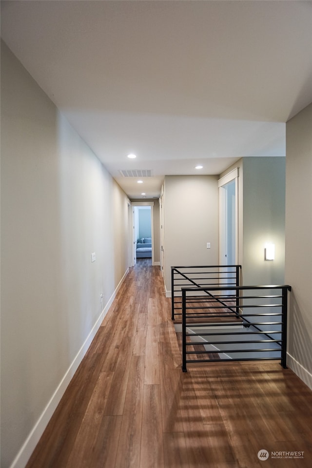 corridor featuring hardwood / wood-style flooring