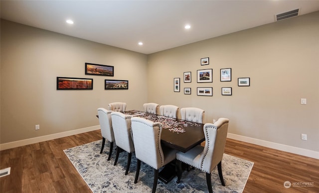 dining room featuring dark hardwood / wood-style floors