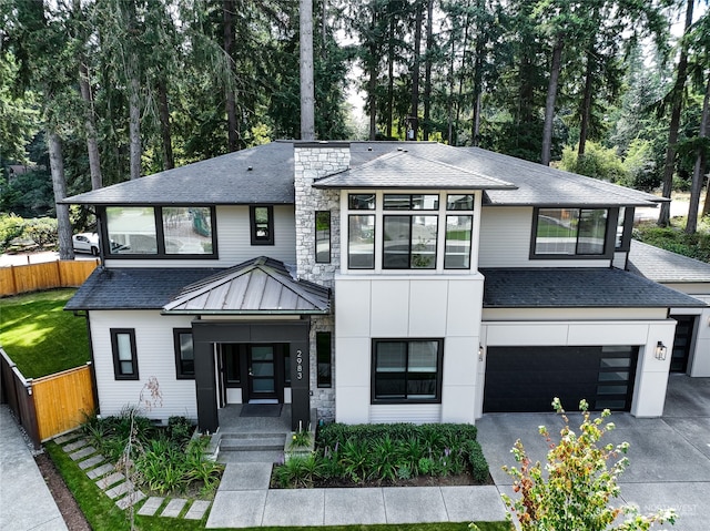 view of front of home with a garage