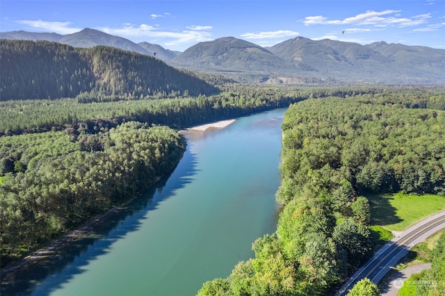 aerial view with a water and mountain view