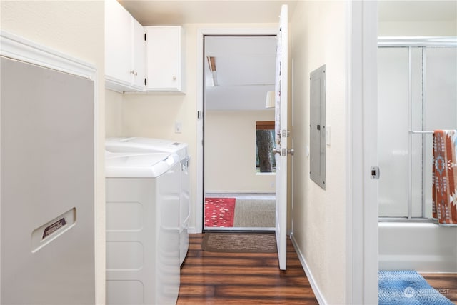 washroom with separate washer and dryer, dark wood-type flooring, cabinets, and electric panel