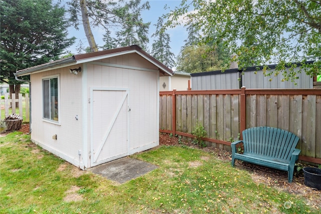 view of outdoor structure featuring a yard