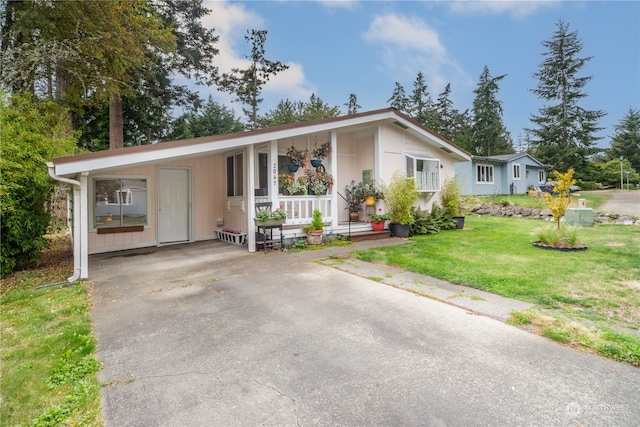 view of front of home with a front lawn and covered porch