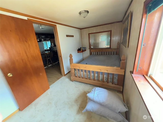 bedroom with crown molding