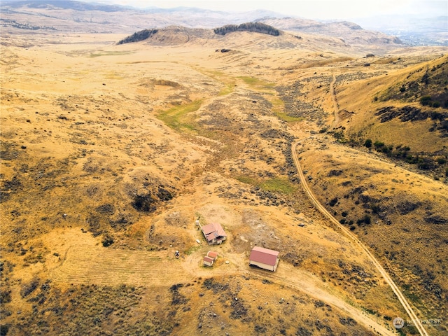 aerial view featuring a mountain view and a rural view