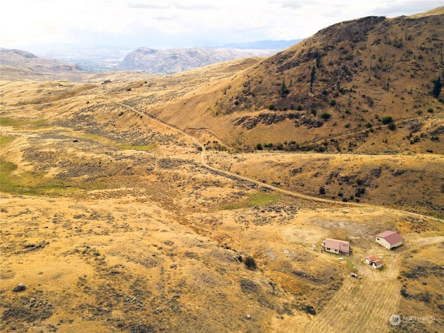 property view of mountains featuring a rural view