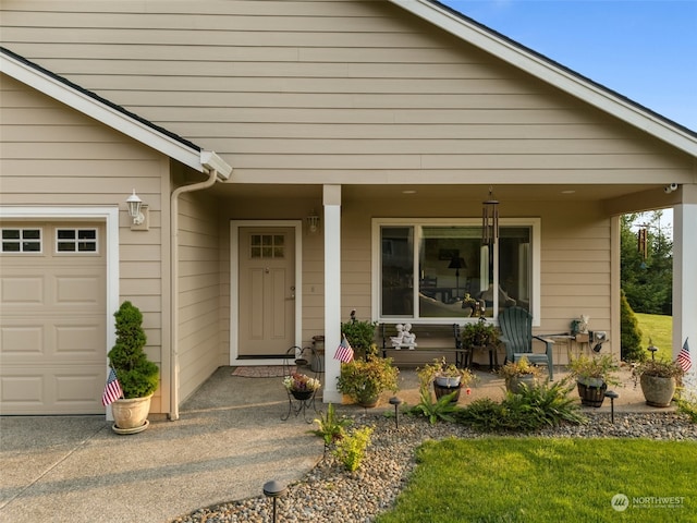 view of front facade featuring a garage and a porch