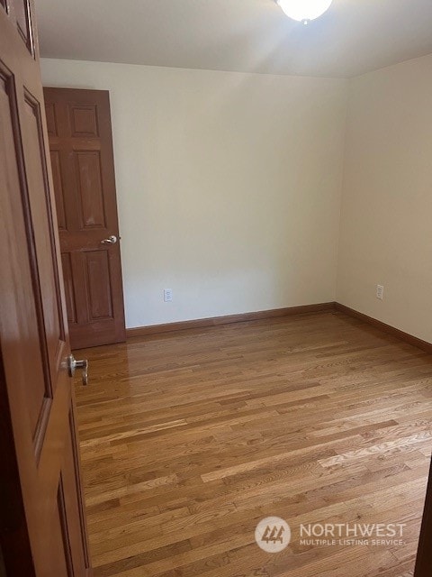 empty room featuring light wood-type flooring