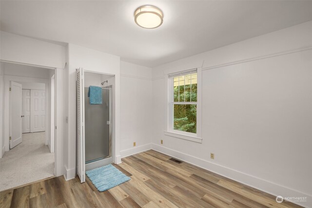 unfurnished bedroom featuring light hardwood / wood-style floors