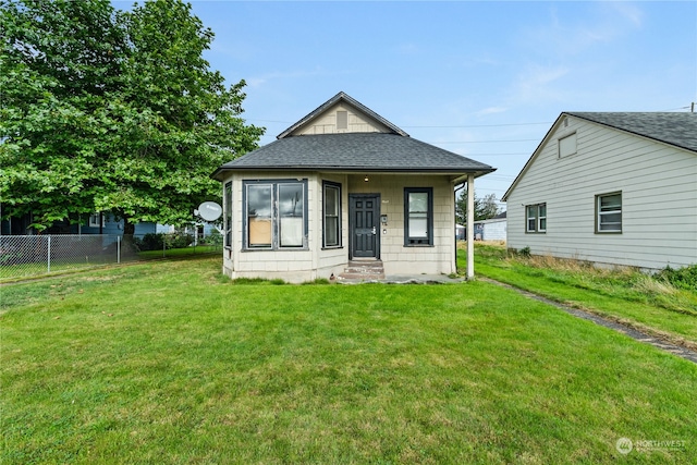 view of front of home with a front yard