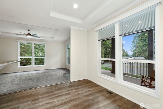 191 E Greenwood Ln, Shelton, WA 98584 - empty room with a tray ceiling, wood finished floors, a ceiling fan, baseboards, and crown molding